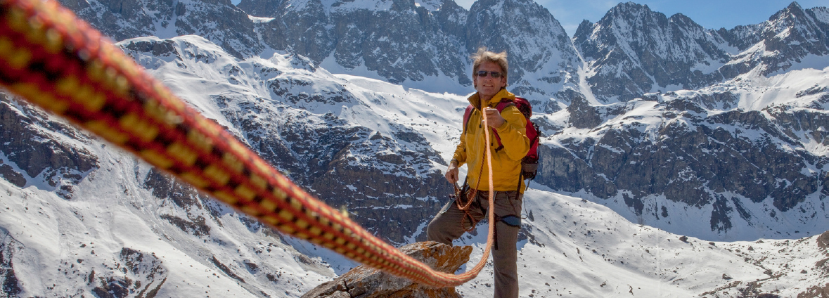 Mountaineering Safety Rope Scene Mountaineer using a safety rope in a snowy alpine environment